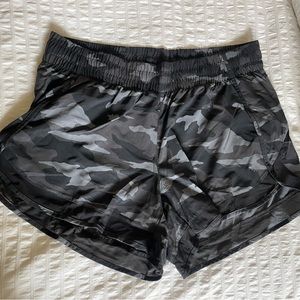 Athleta racer run shorts 4” sz M